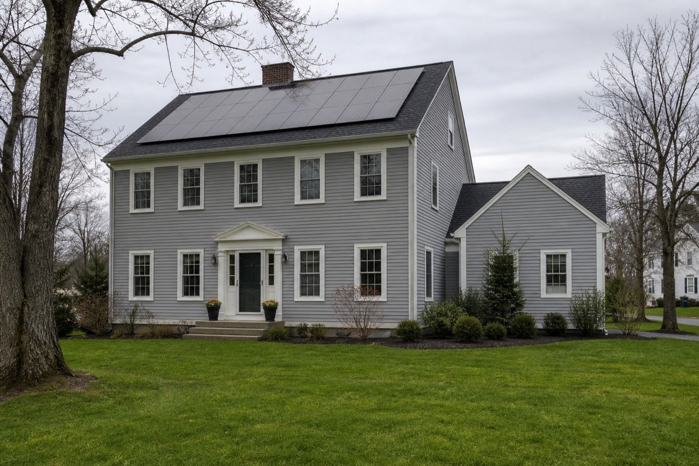 Connecticut colonial home with rooftop solar for an RRES installer guide.